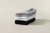 Meias masculinas de algodão puro de comprimento médio nas cores sólidas preto, branco e cinza, adequadas para uso formal e casual, absorventes de suor e respiráveis, para primavera, outono e inverno