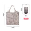 Bolsa de compra portátil de poliéster, grande, de tela floral 190T, disponible en stock. Bolsa plegable al por mayor. Bolsa de regalo publicitaria.