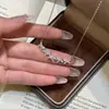 Collar de plata 999 con diseño de flor de glicina para mujer, cadena de clavícula de lujo con colgante de circonita sonriente.
