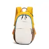 Nova Mochila Cross-border Estilo Coreano Bloco de Cores Simples Leve para Homens e Mulheres Bolsa para Viagem ao Ar Livre Caminhada Mochila Casual Impermeável
