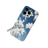 Fornecimento transfronteiriço: Capa de celular com fundo azul e flor de magnólia branca cintilante para 16 Plus, apresentando um design impresso em alta definição estilo chinês usando película de transferência de calor