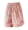 Bienes de Fujian protección solar para exteriores no sofocantes holgados de pierna recta pantalones cortos para hombre de moda cintura elástica pantalones de cinco puntos