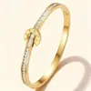 Pulsera trenzada de acero inoxidable con hebilla de herradura estilo europeo y americano, simple y moderna, pulsera ajustable de acero de titanio, pulsera de alambre de acero