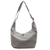 Bolso bandolera de lona estilo perezoso para mujer, gran capacidad, versátil, bolso tote para ir al trabajo, texturizado, simple, casual, color sólido, bolso de axila