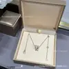 Collar Baoge Primavera Hombre Rojo Mismo Estilo Borde Cerámico Diamante Cintura Grande V Oro CNC Precisión Plata 925 Grueso Chapado 18K