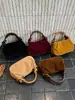 Bolso pequeño cuadrado de color liso estilo coreano para mujer, nuevo diseño 2026 casual y apto para el trabajo, bolso de hombro o bandolera simple y retro