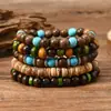 Amazon venta caliente transfronteriza pulsera de cuentas hecha a mano estilo retro para hombre pulsera de línea elástica multicapa con cuentas de madera árbol de la vida