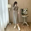 Elegante y sofisticado conjunto de suéter tejido con falda plisada, vestido de dos piezas de invierno nuevo con un toque de alta gama