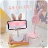 Soporte para Teléfono Conejito Pequeño Elevador Ajustable para Escritorio Soporte de Apoyo Perezoso para Selfies y Transmisiones en Vivo Lindo Dibujo Animado Soporte para Maratones de Series