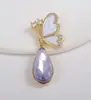 Moda Entrada Lujo Cien Chapado en Oro Colgante Lazo Amor Anillo Doble Conejo Perla Joyería Accesorios Colgante Maitreya