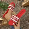 Pantuflas de Mujer 2026 Verano Nuevo Estilo Étnico Pantuflas Planas para Uso en Exteriores Sandalias Tejidas de Moda Europea y Americana para Mujer