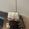 Bolso para Mujer 2026 Verano Nuevo Color Sólido de Moda Cara Sonriente Versátil Simple Elegante Bolso Pequeño de Hombro Cruzado