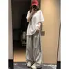 Calça Feminina de Verão Nova Modelo Plus Size Estilo Americano Listrada Bordada Secagem Rápida 150kg Casual Calça Reta Perna Larga Respirável Calça Esportiva