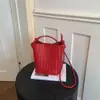 Bolsa Saco com Padrão Trançado Transfronteiriça para Mulheres 2026 Verão Novo Estilo Estilo Suave Bolsa de Ombro Único Transversal Versátil Casual Bolsa Mãe-Filha