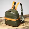 2025 Estilo Caliente Estilo Japonés y Coreano Mochila Pequeña de Moda para Mujer Mochila Pequeña Versátil y a la Moda de Cuero Genuino Bolsa Ligera para Viajes Casuales