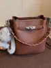 Bolso Cruzado de Hombro Estilo Perezoso Exquisito y Elegante Transfronterizo Primavera 2026 Nuevo Versátil Bolso Cubo de Hombro Cruzado