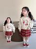 Conjunto de suéter de primavera para meninas 2025 novo estilo ocidental infantil moda primavera para bebês JK saia plissada conjunto de duas peças
