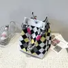 2025 Nova Bolsa de Balde de Tricô com Design de Nicho Estilo Coreano Moda Feminina Versátil para Viagem Compras Bolsa de Mão Bolsa