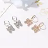 Nuevos pendientes europeos y americanos de moda con forma de mariposa y diamantes, elegantes y elegantes pendientes de mariposa, accesorios de fábrica.
