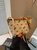 Comércio Exterior Textura de Alta Qualidade Moda Retrô Simples Versátil Bolsa de Ombro Feminina 2025 Verão Nova Bolsa Balde Transversal