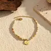 Pulsera colgante martillado con cuentas de piedra natural vintage europea y americana para mujer, accesorio de mano de nicho estilo étnico chapado en oro de acero inoxidable