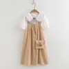 Vestido de tirantes dulce lindo japonés Verano Holgado Adelgazante Vestido versátil Camisa Dos piezas Al por mayor Moderno
