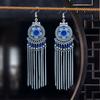 Aretes largos de borla de cadena larga con cuentas de estilo étnico transfronterizo, de alto sentido femenino, bohemios para viaje, joyería para la oreja al por mayor