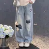 Elegante y a la moda chaleco dulce para niñas estilo coreano camisa con cuello de muñeca conjunto de pantalones vaqueros versátiles y modernos para llevar en capas