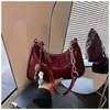 Bolso de comercio exterior transfronterizo de la fábrica de origen, bolso pequeño cuadrado de un solo hombro de color sólido para llevar debajo del brazo con estampado de piedra, bolso de moda para mujer