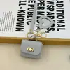 Mini bolsa de presente simples pode guardar fones de ouvido e chaveiros, bolsa de fone de ouvido de cor sólida, pingente de couro, bolsa quadrada criativa, bolsa longa