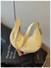 Bolso grande de estrella y luna de nicho estilo coreano de alta costura, nuevo modelo 2026, bolso casual de un solo hombro bajo el brazo estilo ins