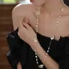 Nuevo collar de perlas artificiales de doble capa, cadena para la clavícula de moda exquisita transfronteriza, cadena de suéter de lujo ligero estilo francés