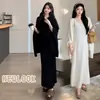 Conjunto casual de maternidad estilo francés para primavera y otoño, que incluye un vestido de punto tipo slip con un chal tipo capa para alargar la figura y realzar la elegancia.