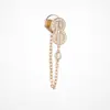 Aretes de oro de 18 quilates de Fred incrustados con diamantes con diseño de nudo doble y elegante collar con borla en forma de pera, un toque de lujo y moda