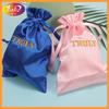 Bolsa de satén al por mayor de fábrica, bolsillo tipo manojo, bolsa de almacenamiento de joyas de seda sintética, bolsa de almacenamiento de cosméticos para peluca