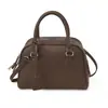 Bolso de mano de lujo transfronterizo, diseño de nicho, sensación de alta gama, gran capacidad, bolso tipo almohada con patrón de lichi vintage, bolso tote para mujer, bolso de mano pequeño