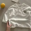 Nuevos estilos de primavera y otoño: bonitos polos de manga larga con cuello mao para niños y niñas, con adorables diseños de elefantes de dibujos animados y cierres de botones