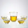 Taza de té de vidrio resistente al calor para uso doméstico, engrosada, resistente al calor, anti-quemaduras, taza de té uniforme, dispensador de té simple estilo japonés, taza de té pequeña
