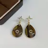 Pendientes Colgantes Populares de Piedra Ojo de Tigre Aguja de Plata Maillard Retro Elegantes Versátiles Pendientes de Lujo Accesible Pendientes de Gama Alta para Mujeres