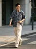 Camisa retro japonesa a cuadros desgastados de manga corta con cordón en el dobladillo para hombre, nueva blusa casual holgada versátil de verano para mujer