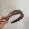 Diadema simple de esponja de ala ancha de nuevo estilo para lavarse la cara, accesorio para el cabello de corona alta versión coreana, diadema de cuadros para sujetar el cabello