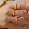 Europa e Estados Unidos transfronteiriço novo aço inoxidável redondo anel de contas moda banhamento de luxo 18k ouro real personalidade anel de jóias por atacado