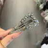 Pinza para el pelo triangular de felpa gris de moda, resistente, con pedrería, para mujer, clip lateral versátil de temperamento de alta gama