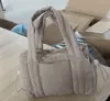 Bolsa de Ombro Acolchoada Fofa Feminina em Estoque Mini Bolsa de Ginástica com Alça de Ombro Destacável Bolsa Transversal Pequena para Viagem
