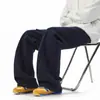 Calça Moletom Scimitar Desconstruída Estilo Retrô Americano para Homens e Mulheres, Marca Tendência de Inverno Calças Casuais Versáteis com Caimento, Calças Esportivas Pesadas de Perna Larga