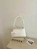 Bolso de Hombro Cruzado Casual de Alto Valor con Patrón Tejido Retro de Nicho Transfronterizo para Mujer 2026 Nueva Moda