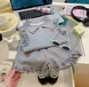 2026 Nuevo Estilo Moda Casual para Niñas Traje de Algodón Puro Verano Camisa Polo y Shorts para Niñas Conjunto Elegante de Dos Piezas