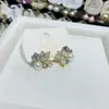 Pendientes de Mariposa y Flor con Incrustaciones de Diamantes Dulces y Lindos Estilo Bosque para Mujer, Gama Alta, Versátiles, Estilo de Lujo Ligero Nicho