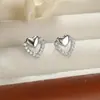 Pendientes de botón de corazón de doble capa con diamantes Luochen para mujer, dos tonos dorado y plateado, diseño de corazón hueco, totalmente incrustados con piedras de circonita, pequeños y dulces, adecuados para el uso diario