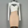 Nuevos Productos de Dongdaemun, Corea del Sur: Conjunto de Falda para Mujer, Vestido Ajustado con Tirantes + Camiseta de Manga Larga Conjunto de Dos Piezas en Capas, Estilo Coreano